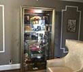 Organized display cabinet with decorative items
