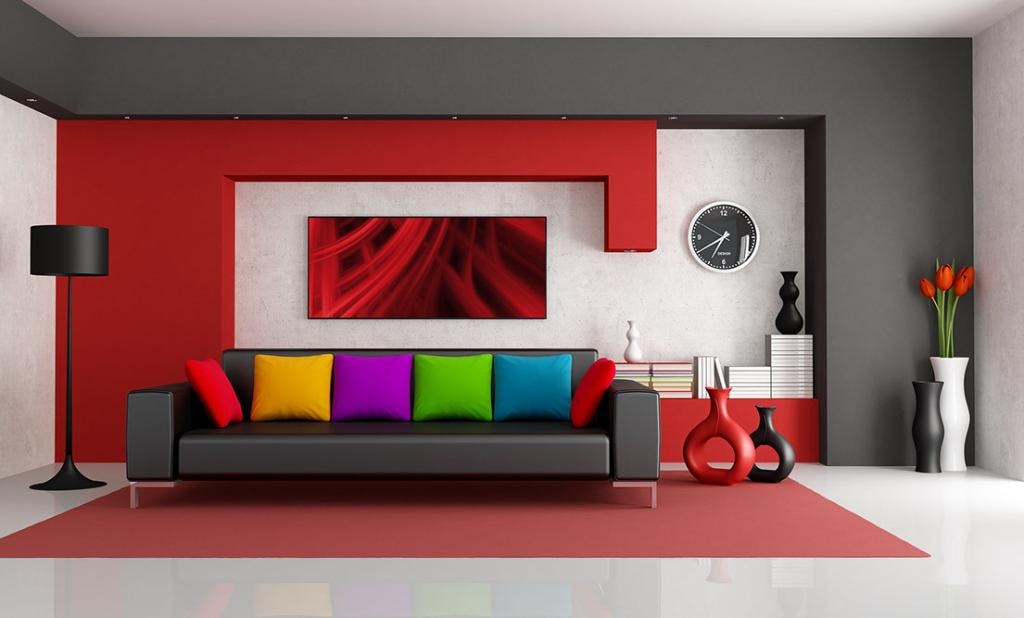 Modern living room with red accent wall and colorful pillows